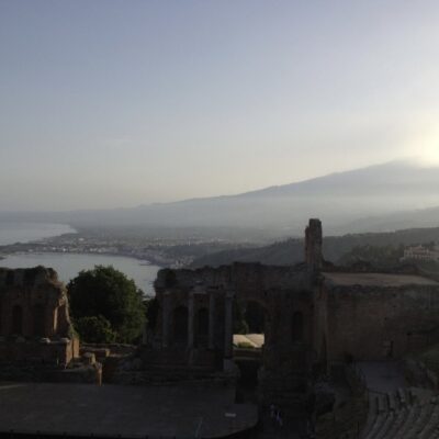 Mount Etna and amphitheater ruins