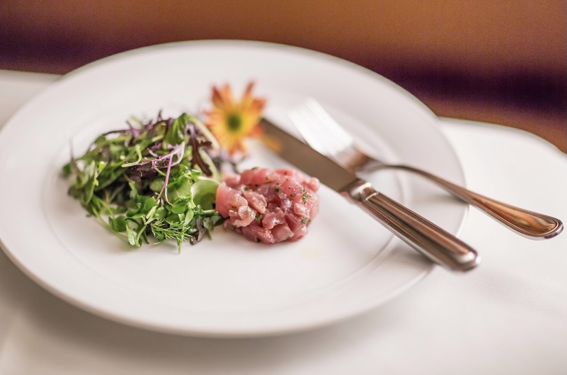 Tuna with mixed greens and edible flowers
