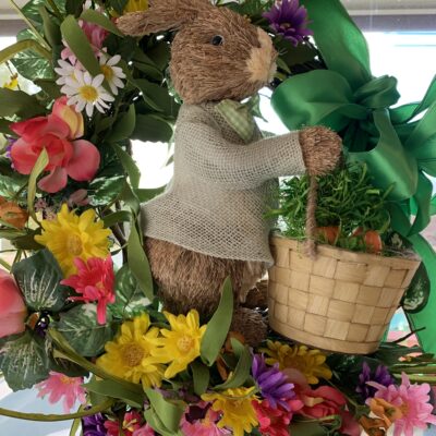 Easter wreath with flowers and Easter bunny