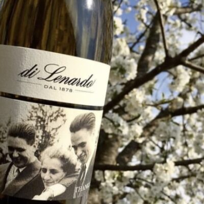 Bottle of Di Lenardo wine with flowers