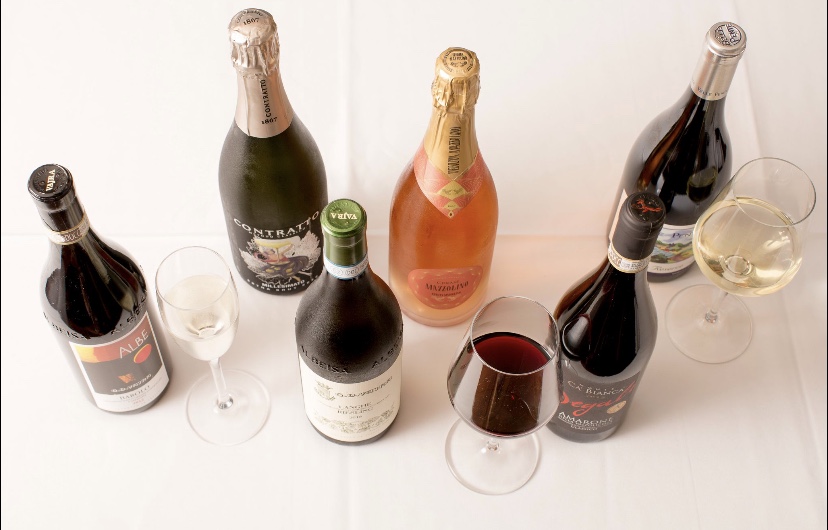 Overhead photo of wine bottles and glasses