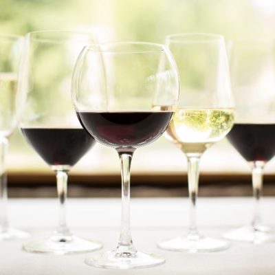 row of glasses of wine