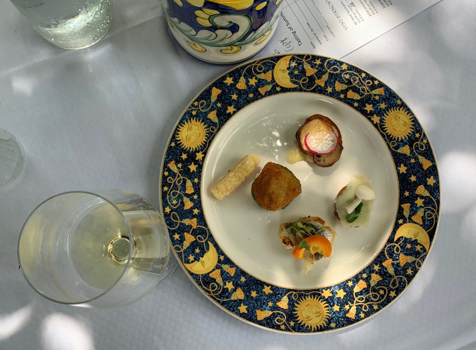 Mixed apps and a glass of wine