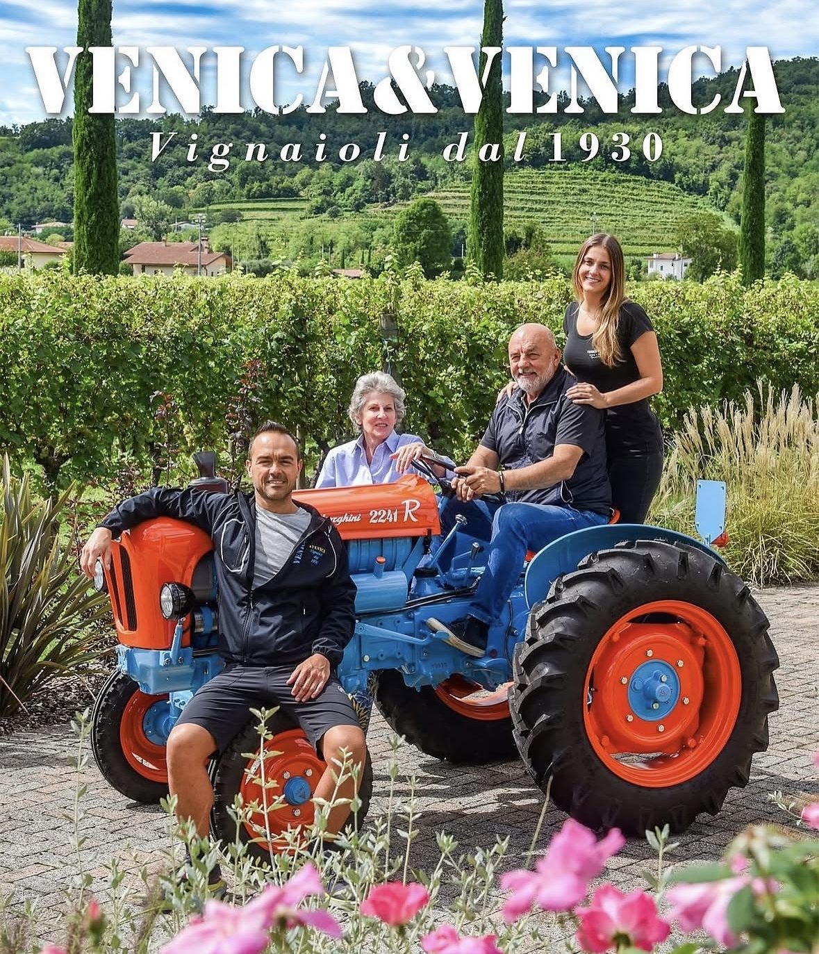 Venica family on a tractor in front of the vines